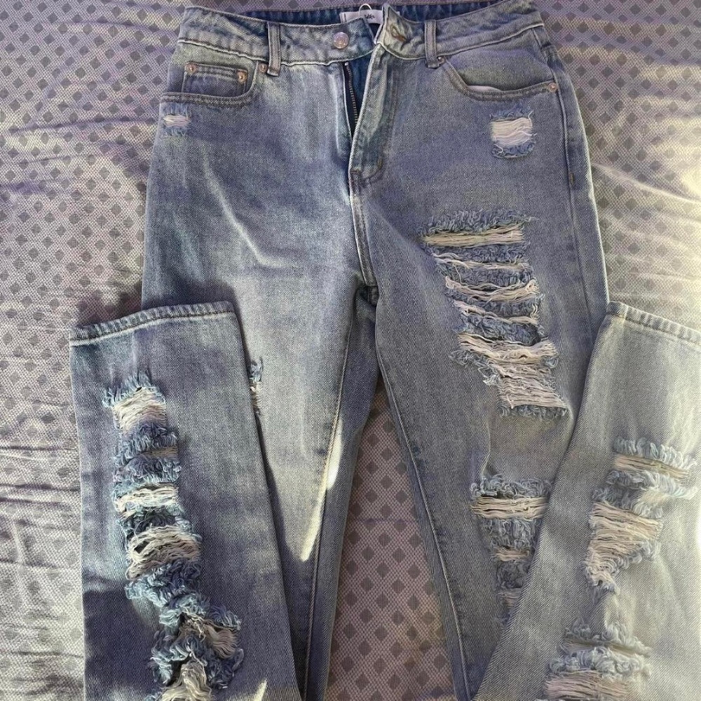 adika ripped straight jeans